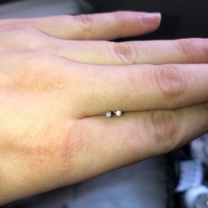 Two sterling silver 1mm diamond nose studs